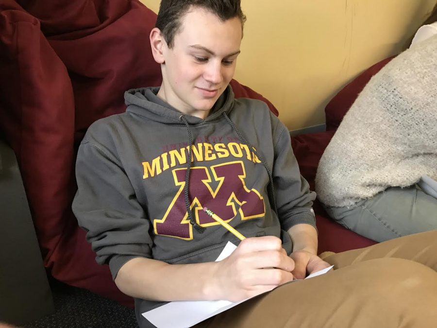 Junior Terry Cheney fills out his sheet, "It was interesting to think about the spaces and people I find important to me."    
