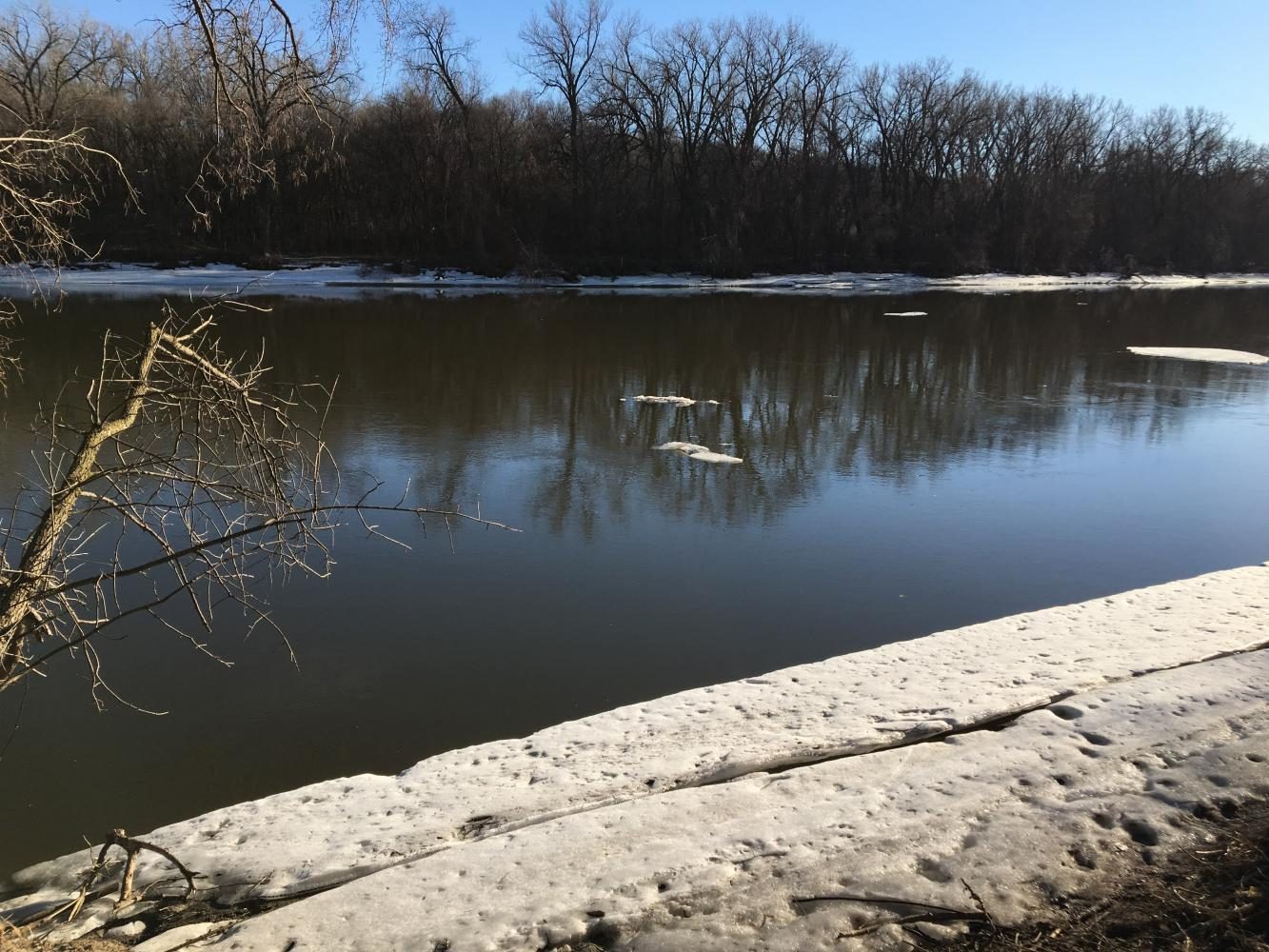 Receding ice banks along the Mississippi River suggest a trend of increased global temperatures.