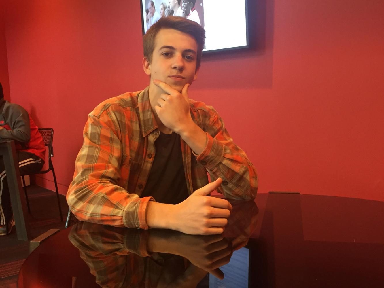 Junior Nik Elsaesser showcases his " dress well to guess well" ritual.