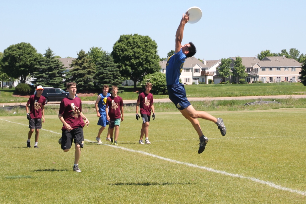 John+Addicks+OToole+reaches+for+a+high+pass+during+the+Minnesota+Ultimate+High+School+Championship.+The+team+finished+9th+in+Division+III.