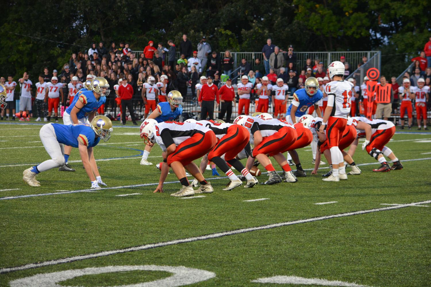 Crusaders and Wolfpack line up. 