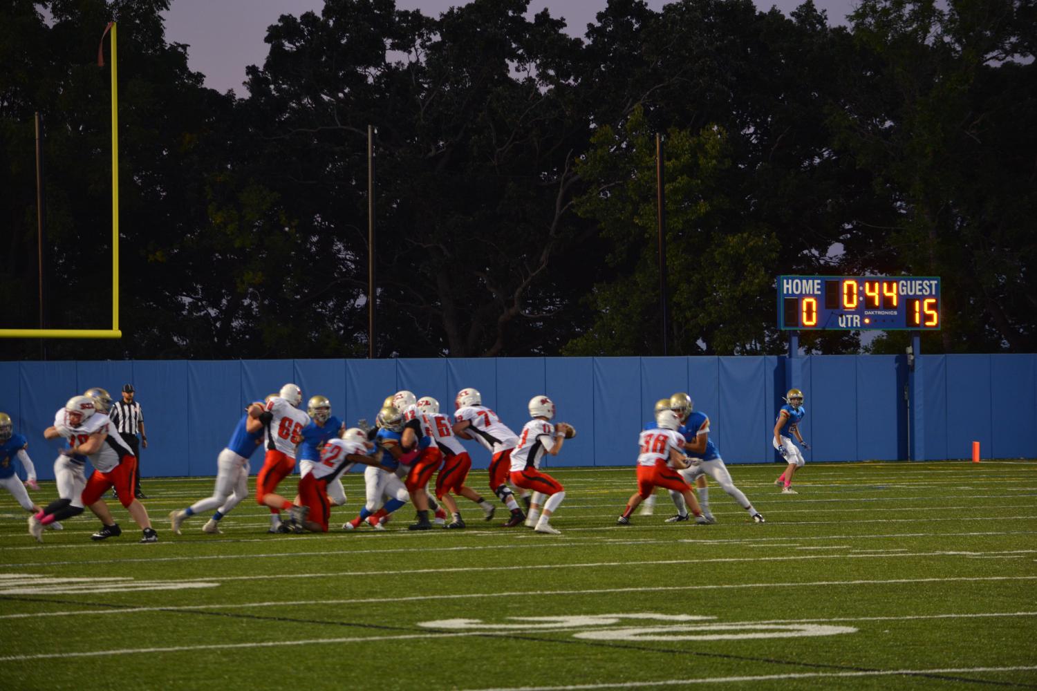 Crusaders and Wolfpack players in a massive pile up. 