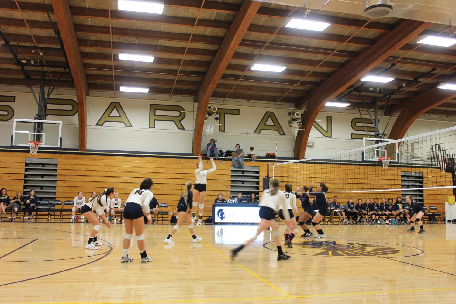 Junior Blythe Rients is ready to dominate as she jumps to hit the ball. 