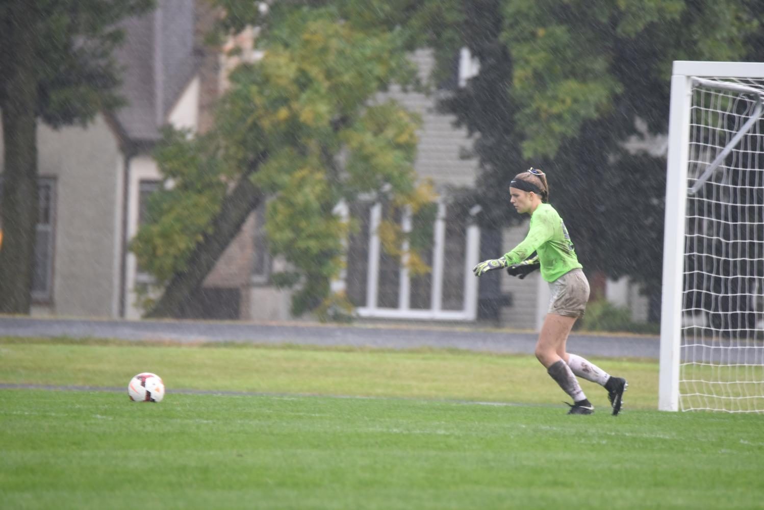 Senior Belle Smith awaits an incoming ball.