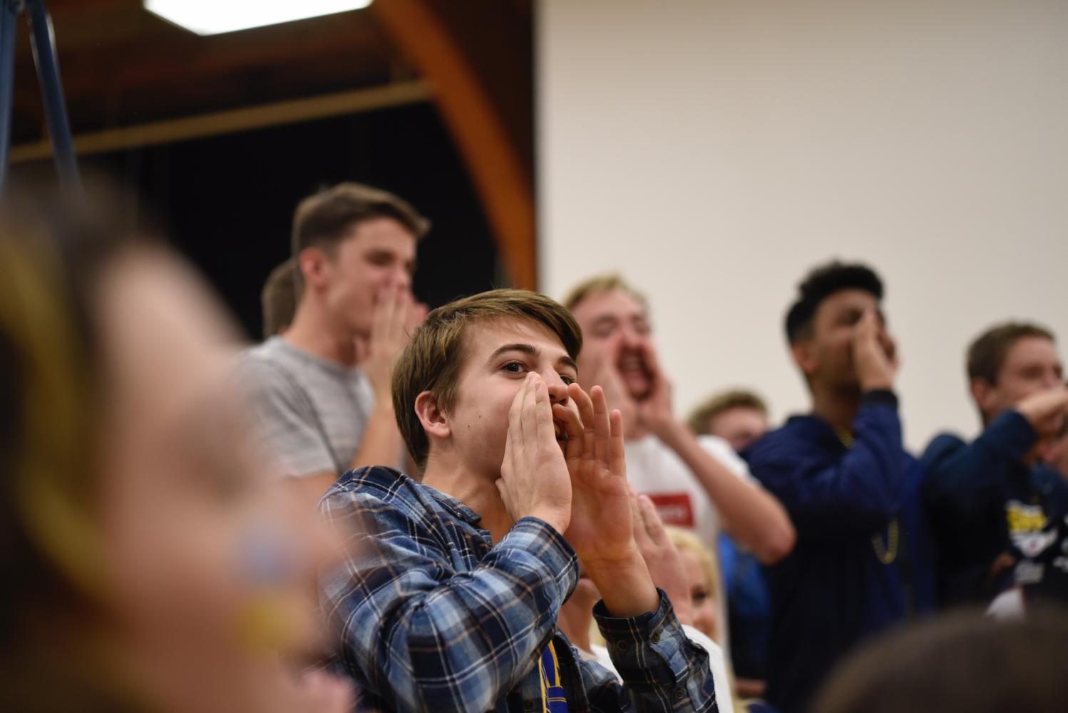 Senior Nik Elsaesser shouts for his fellow seniors at Pep Fest. 