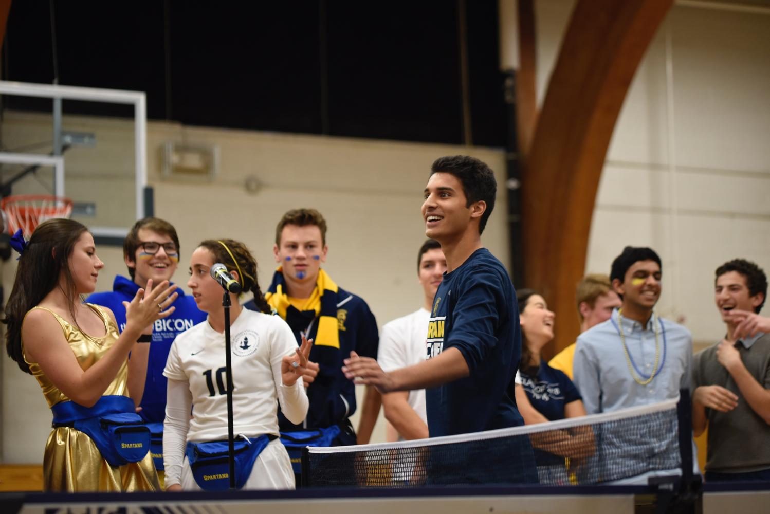 Husaam Qureishy celebrates winning a point in the ping pong championship.