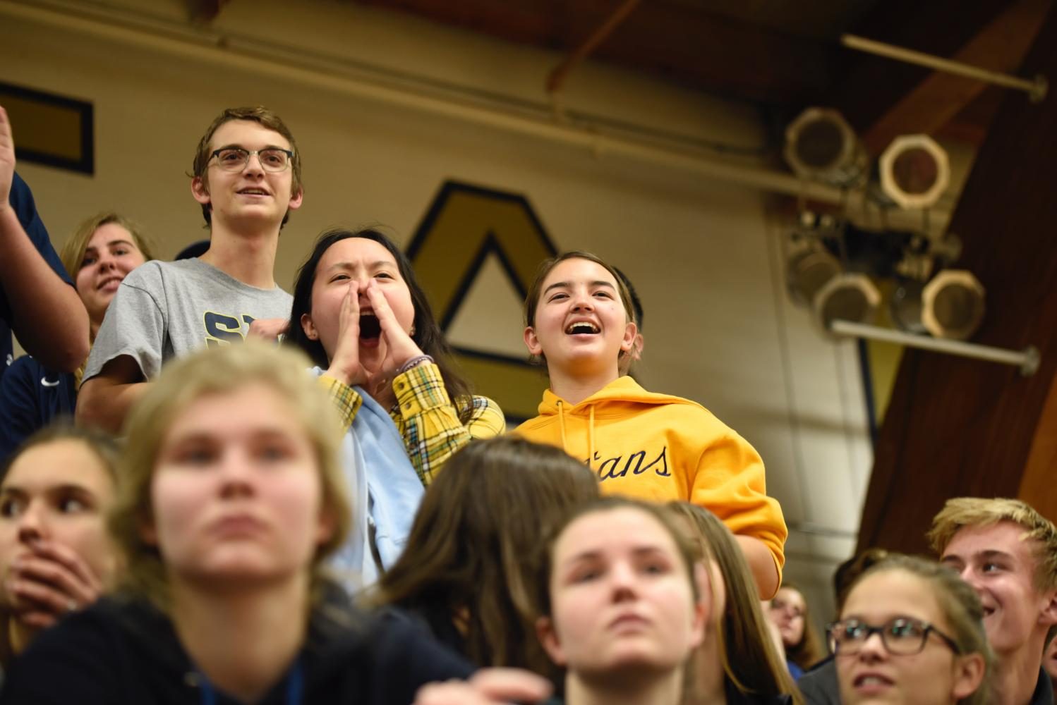 Juniors Roan Chafee, Gemma Yoo and Abby Lanz cheer for the juniors at Pep Fest.