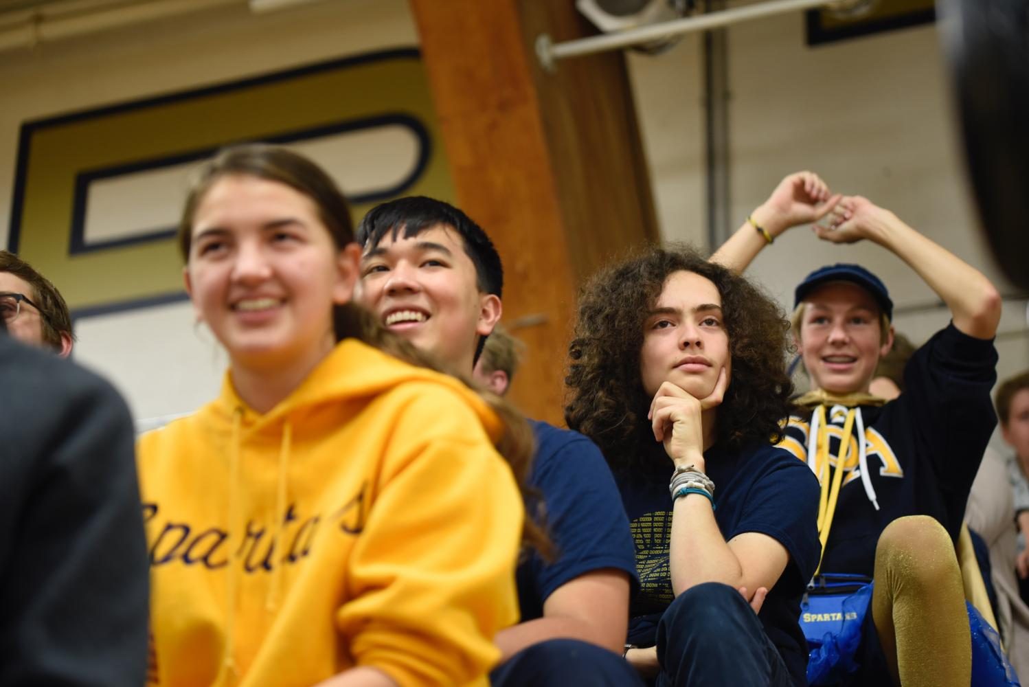 Juniors Abby Lanz, Ben Putaski, Gabriel Konar-Steinberg and 9th grader Jackson Small watch Pep Fest festivities. 