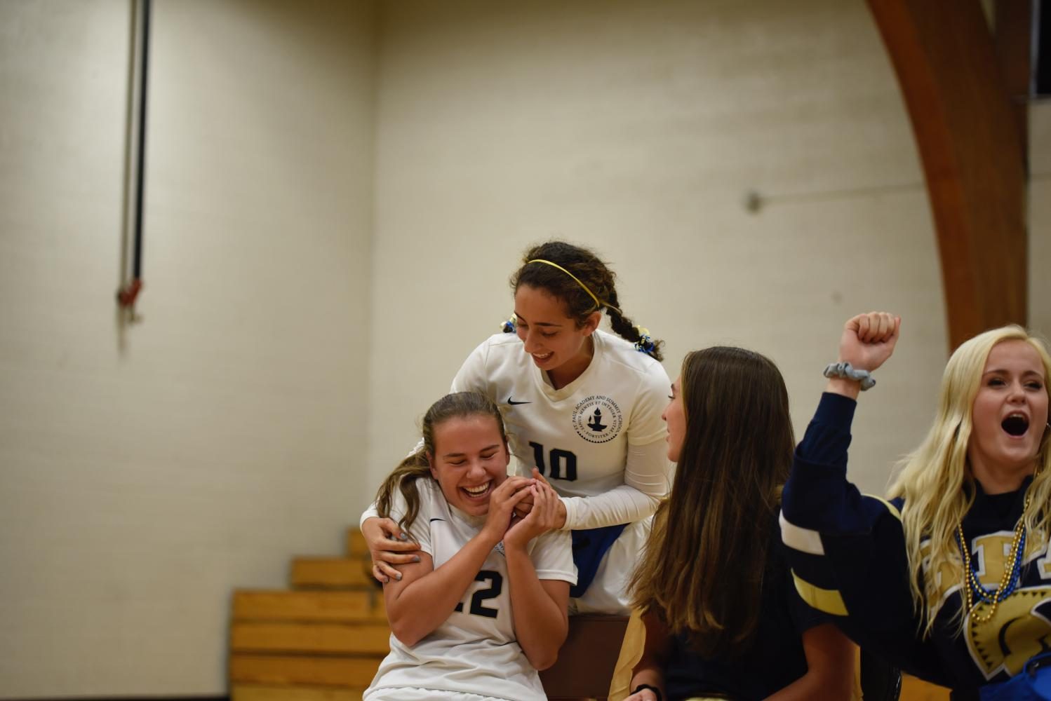 Seniors and captains of GVS Dina Moradian and Kelly Fiedler cheer during captain challenges. 