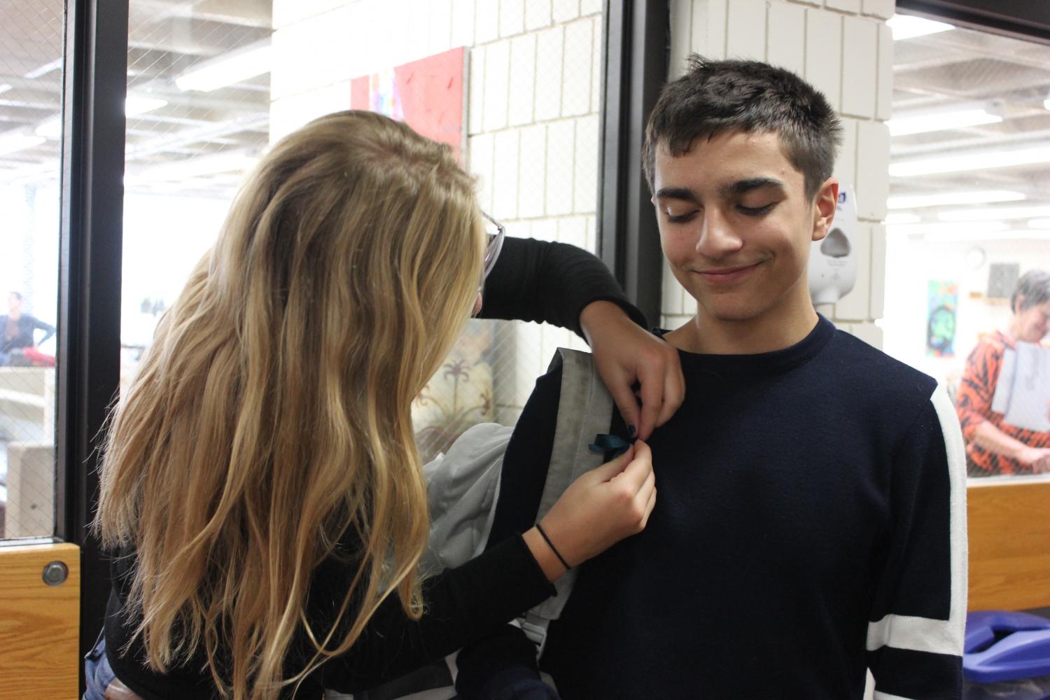 Following the SADD assembly on creating a culture of consent, faculty and students wore ribbons to voice their support for a positive culture on Oct 12. 