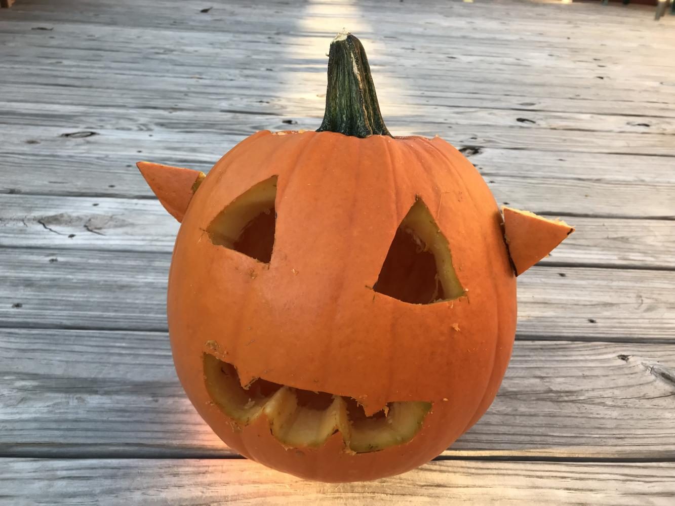 WHAT YOU NEED: 
Pumpkin (any size), pumpkin saw, something to scoop the inside of the pumpkin with, and a sharpie. 