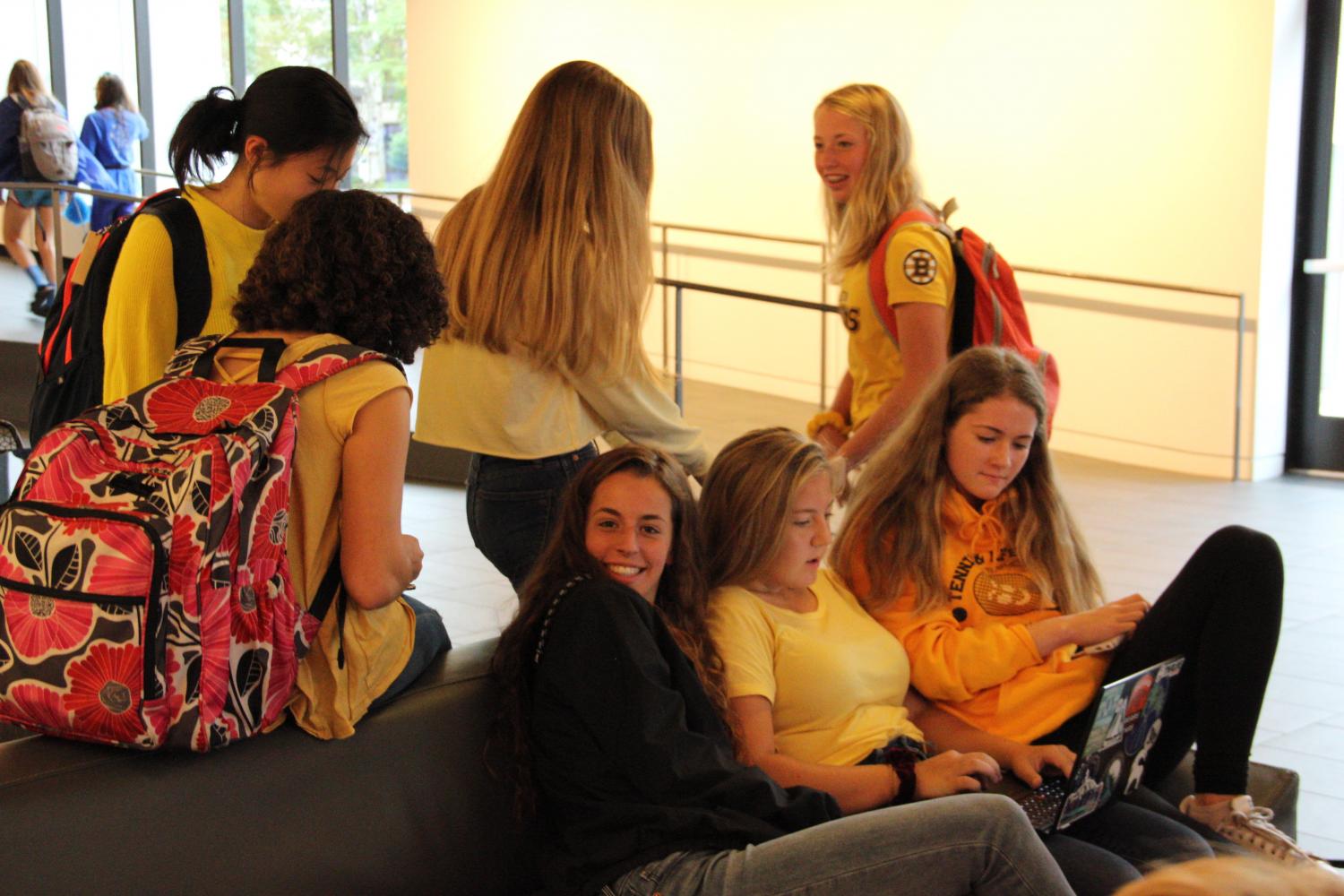 Sophomores Lori Li,Libby Cohen, Martha Sanchez, Pia Schultz, Sophia Heegaard, and Clark Waltz gather in the Huss Center after the Homecoming Kick off Assembly. 