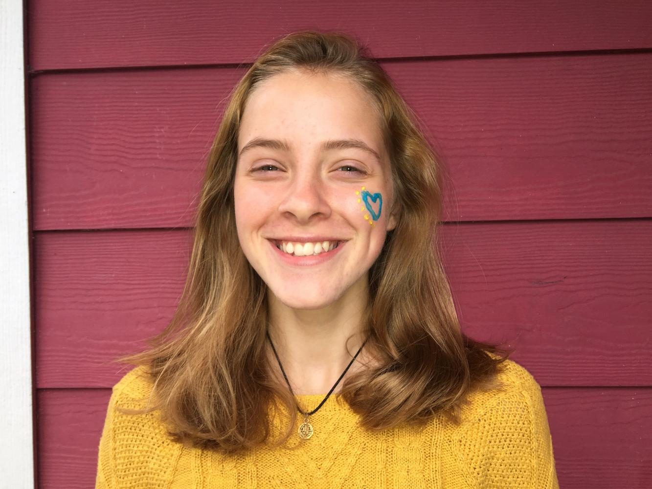 8th grader Harper Enneking-Norton models some Spartan spirit with blue and gold face paint. 