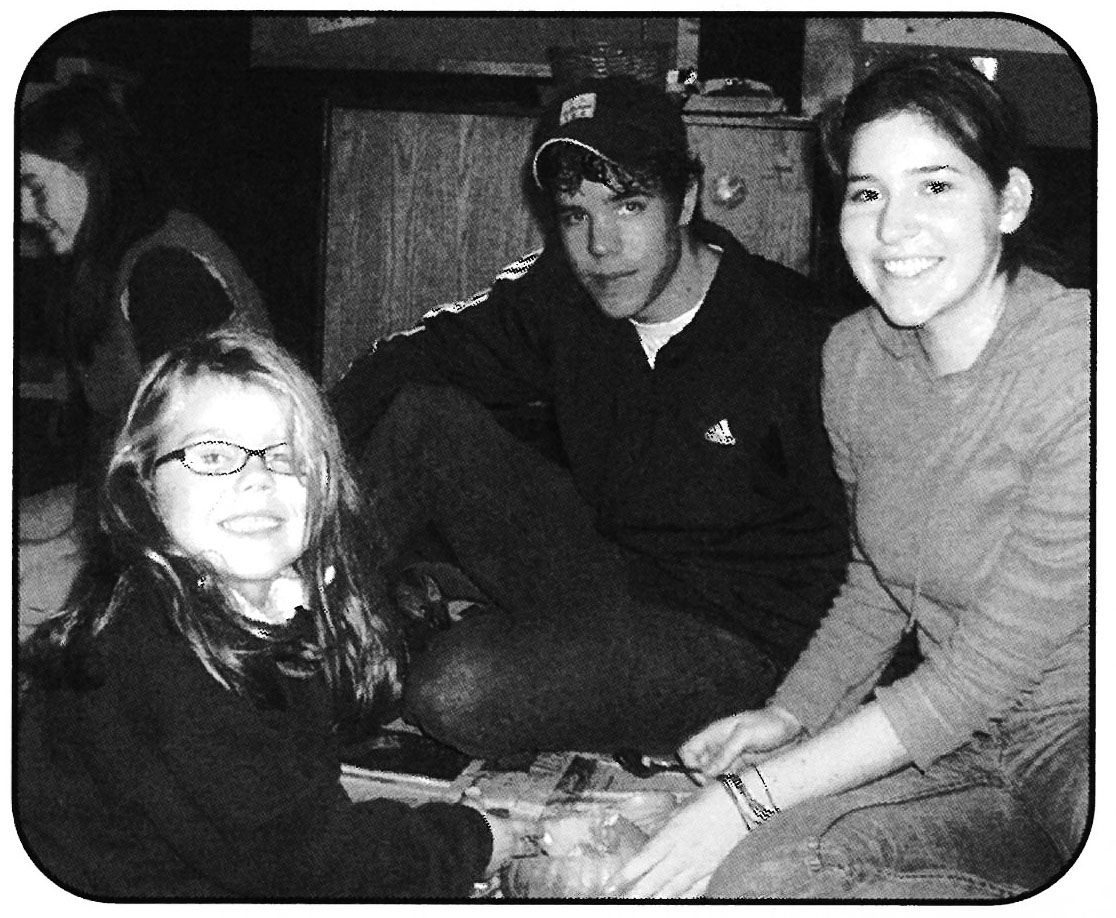 FLASHBACK. Seniors in 2006 carve pumpkins with current senior Jessica Citron. The senior class upheld this fall tradition on Oct. 23, and 86% of senior lifers participated. 