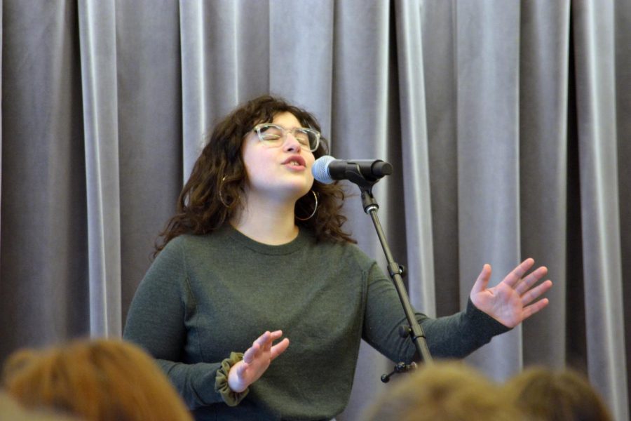 Senior Mira Zelle elicited strong reaction from the crowd with her rendition of "Ode to the Midwest" by Kevin Young.