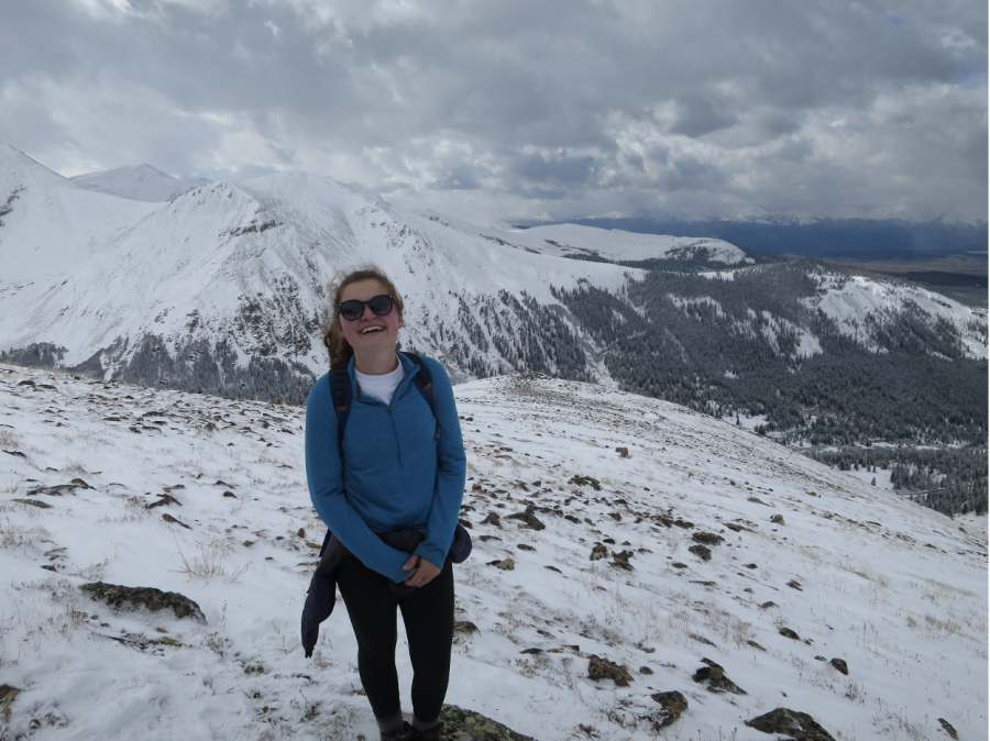 Junior Betsy Romans summits a mountain after a long day of hiking. "On my first expedition we summited Mount Yale. It was one of the most accomplished feelings I've ever felt," Romans said.