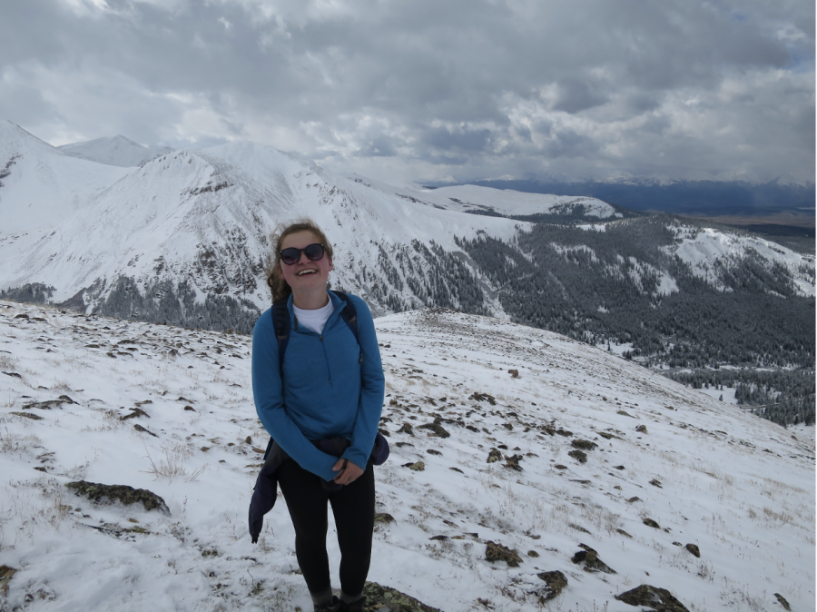 Junior Betsy Romans summits a mountain after a long day of hiking. On my first expedition we summited Mount Yale. It was one of the most accomplished feelings Ive ever felt, Romans said.