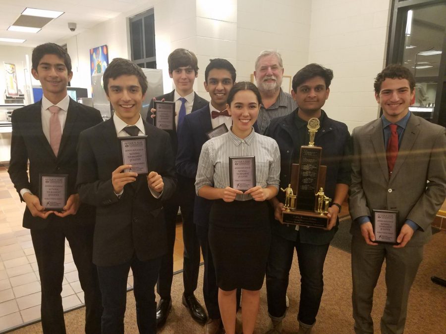 National Qualifiers pose with their plaques and their coach at the Dec. 9 tournament.