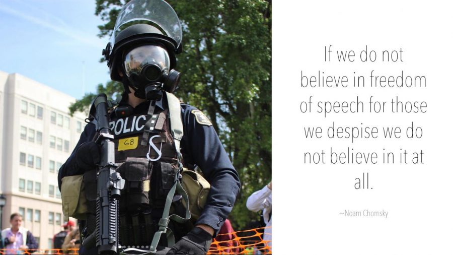 Due to  recent violent protests against right wing speakers at UC Berkeley, university security officers - like the one pictured above - don riot gear and guns. The cost of this extravagant security will now be a factor in deciding if student groups can invite speakers to campus.