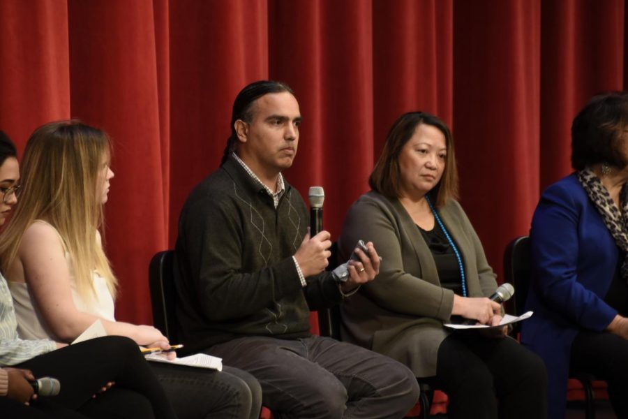 John Hunter, father of a student in third grade at St. Paul Academy and a representative of Native American teaching, speaks on challenging the community to make corrections.