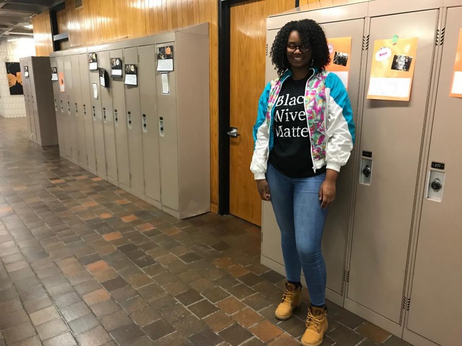 I got the jacket from Ragstock [because] I love 90s windbreakers, and the shirt my dad gave me, and then my Timbs. I probably wear them with 90% of my outfits, said senior Amina Smaller.