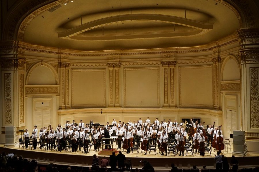 On+Feb.+4%2C+senior+Julia+Wang+played+with+the+Honors+Symphony+Orchestra+at+Carnegie+Hall.+%E2%80%9CCarnegie+Hall+is+just+such+an+amazing+place.+I+went+there+last+year+with+the+%5Bschool%5D+choir+but+I+didn%E2%80%99t+feel+like+it+was+the+same+since+I+didn%E2%80%99t+really+earn+it.+%5BGoing+with+HPS%5D++was+different+because+I+auditioned+and+earned+my+spot+in+this+orchestra%2C%E2%80%9D+Wang+said.