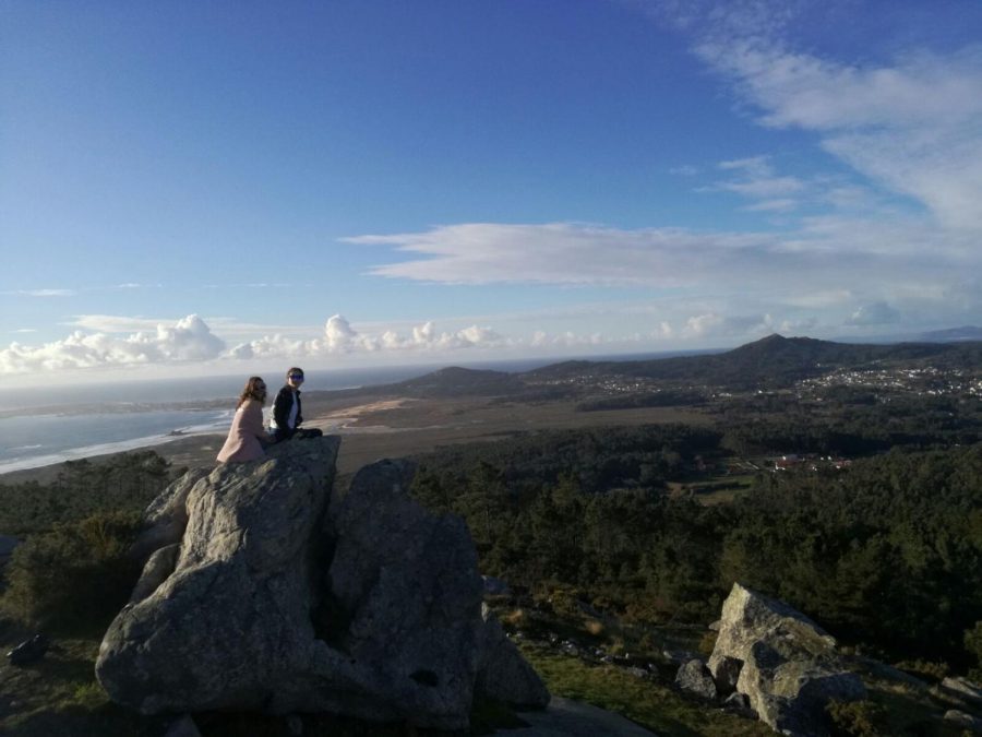 Senior Emma Truman poses up above the clouds while studying abroad in Spain during her junior year. “Before I went, I thought either Spanish culture would be better or American culture would be better but after travelling and going abroad I felt like they can coexist and be good for different kinds of people in their cultures, Truman said. 