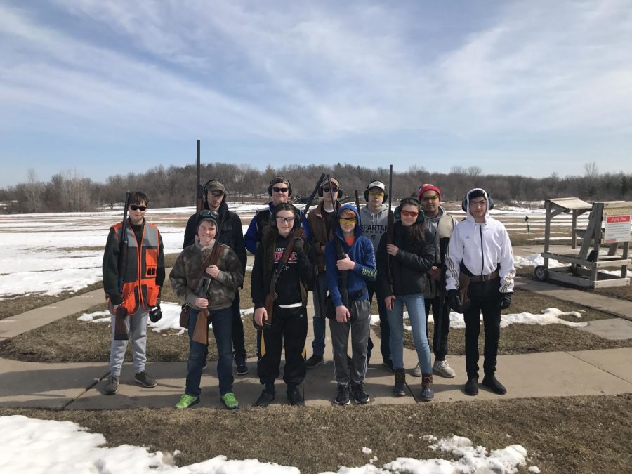 The trap team lines up for a picture after practice.