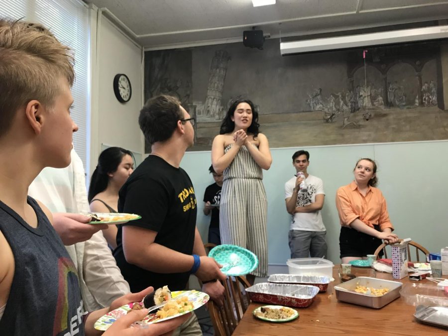 Junior Olivia McCauley stands on a chair and gives a short speech about how happy she is to have had the celebration this year. 