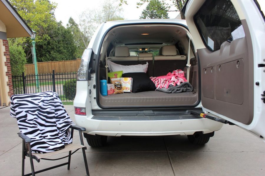 DRIVE IN READY CAR.  Junior Nina Ciresi said, We went to Walgreens and bought snacks... we brought blankets and pillows and someone brought two chairs so we could set them outside.