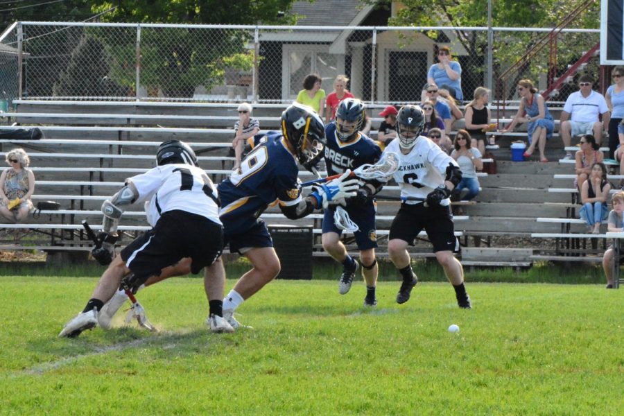 Sophomores Duncan Fleming (10) and Tommy Stolpestad (6) begin a play.