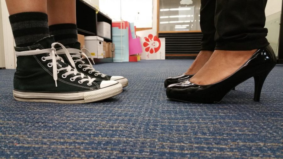 Whether or not high heeled shoes will damage the lunch room floor is a key issue in the debate.