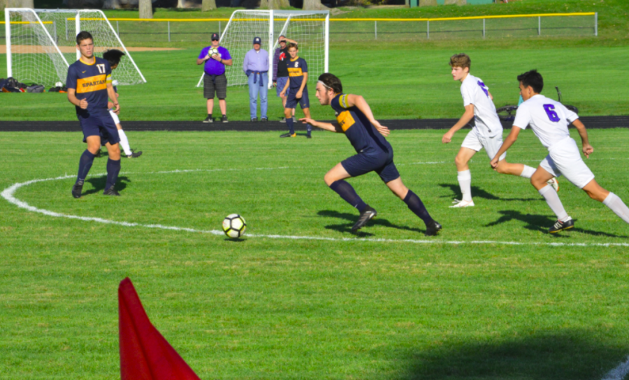 Michael Forsgren takes the ball to the goal during the second half.