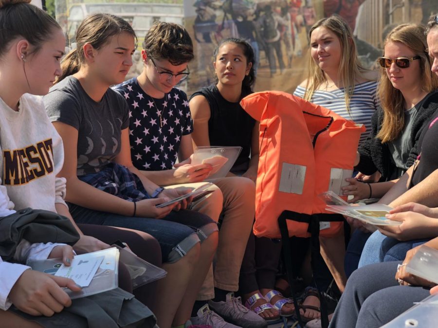 On Sept. 10, students from the History of Refugee Communities in Minnesota class took a field trip to the Forced From Home Exhibit in Minneapolis which puts visitors in the shoes of global refugees. “It was hard to only pick five things. I thought it was an informative experience to be able to engage in the journey many refugees undertake,” senior Kenzie Giese said. The exhibit is open through the Sept. 16.