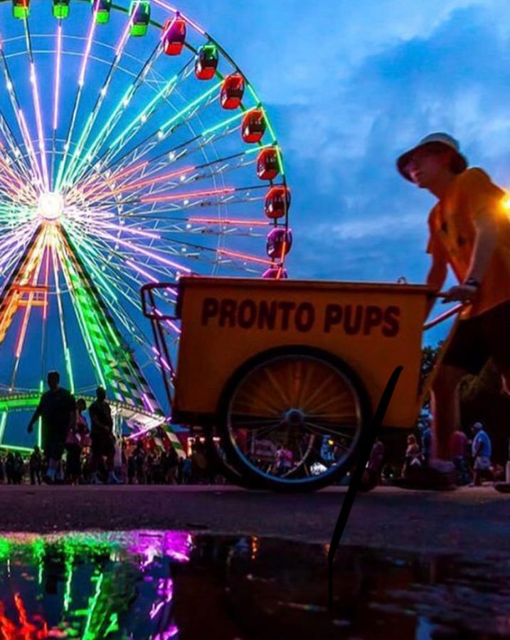 Senior Will Swanson pushes the Pronto Pup cart to and from the ends of the fair. 