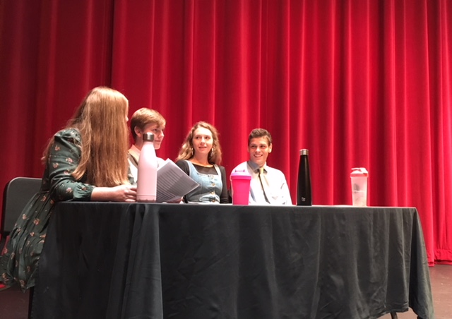 Muriel Lang (third from left) waits with other senior speakers Ellie Nowakowski, Garrett Small, and Eric Lagos at the beginning of the first senior speech assembly on Sept. 14.