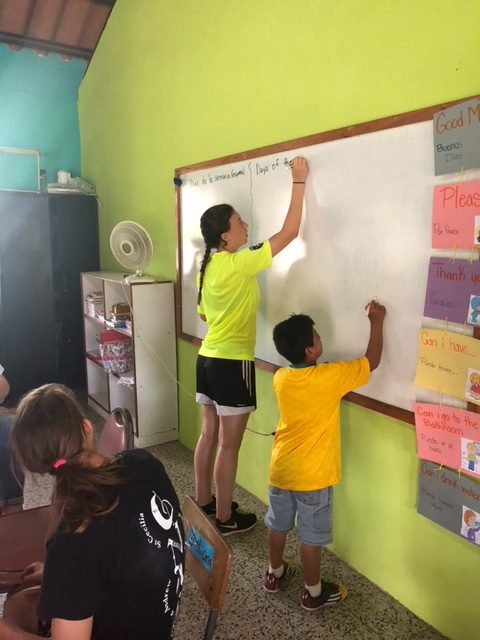 Senior Lauren Osteraas teaches english to Guatemalen children