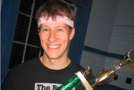 US Math teacher Jasper Turner holds his trophy after winning the Mens World Four Square championship. “I picked it back up again in college while I was working at a summer camp for high school students. Several counselors and myself had a fierce rivalry,” Turner said.