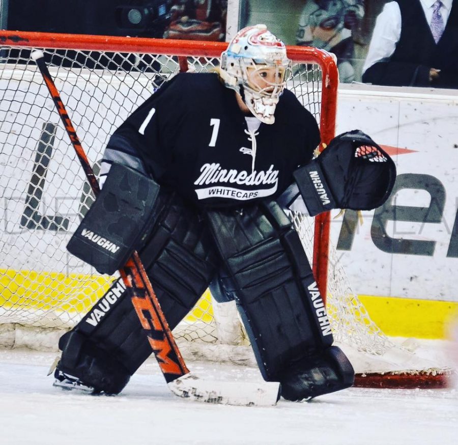 Julie Friend prepares to save a shot for the Minnesota Whitecaps.