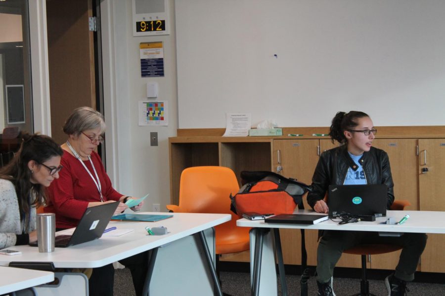 US Math Teacher Mary Lincoln, US English Teacher Kristen Collier, and Senior and President of People for Environmental Protection, Iris Shaker-Check, have a weekly meeting to catch up on their current projects.