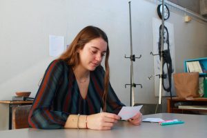 Senior Janie Brunell uses flash cards to study. 