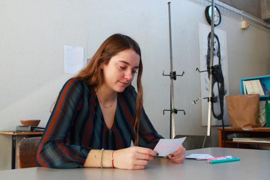 Senior Janie Brunell uses flash cards to study. 