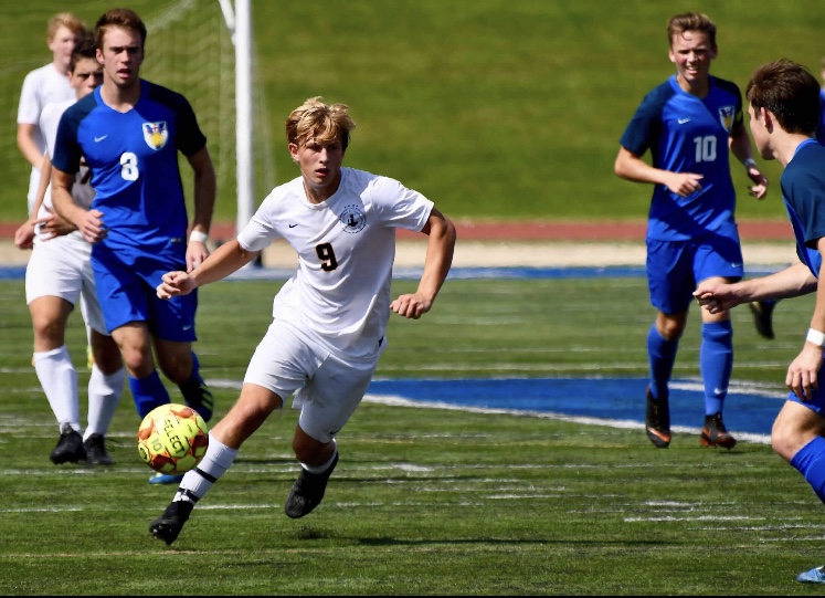 Senior Adam Zukowski looks to move the ball and create a scoring opportunity.
