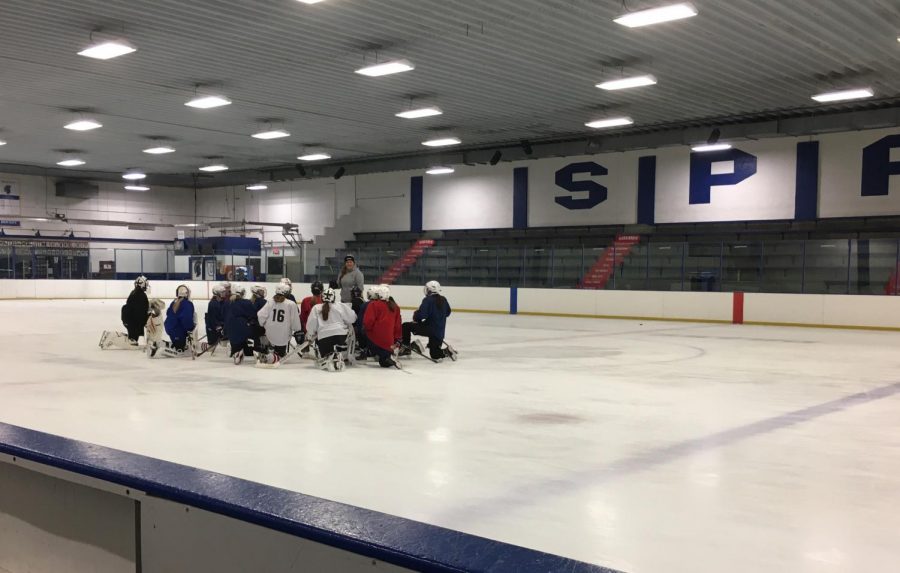 United team hits the ice to prepare to skate with their new coach for the first time.