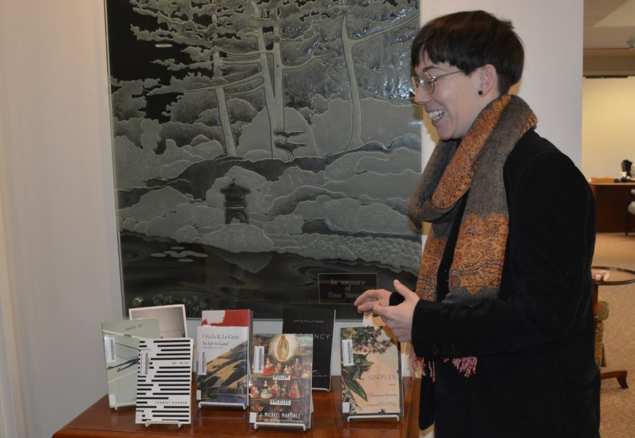 US librarian Kate Brooks sorts through books. "Berlin is an incredibly diverse city. It's both racially diverse and diverse in terms of class and gender expressions. I appreciate that," Brooks said.