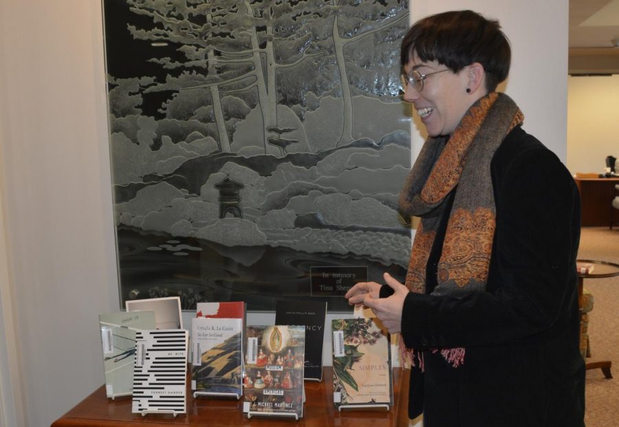 US librarian Kate Brooks sorts through books. Berlin is an incredibly diverse city. Its both racially diverse and diverse in terms of class and gender expressions. I appreciate that, Brooks said.