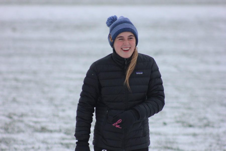 Senior Tessah Green laughs after her team, Nordic, wins the game of capture the flag. "I'm excited for it to actually snow more so we can actually ski, and I'm excited for our trip to Maple Lag for our team trip over Winter break," Green said.