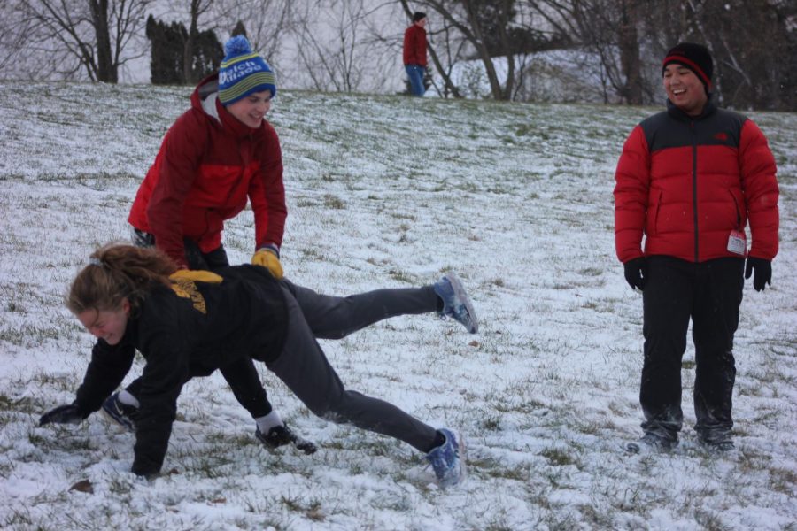 Senior Sammy Ries dives on the ground to tag other students. 