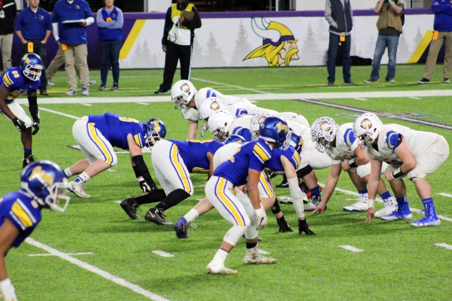 Wolfpack and Waseca stare each other down before the play.