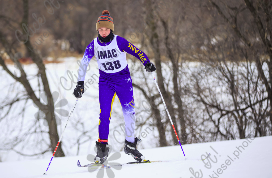 Matt Pauley skis across the course during a meet.